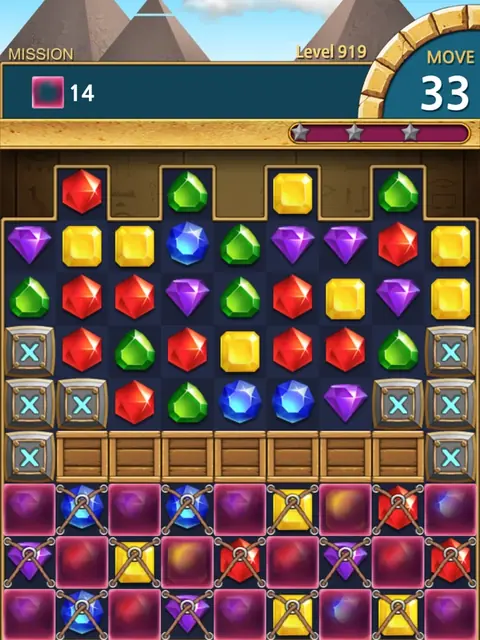 Jewels Pharaoh: tabuleiro de gemas com pirâmides no topo e caixas marcadas com X